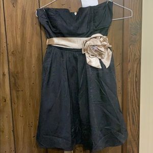 Black and gold tie dress